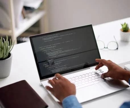 Developers collaborating on web application architecture and implementation
